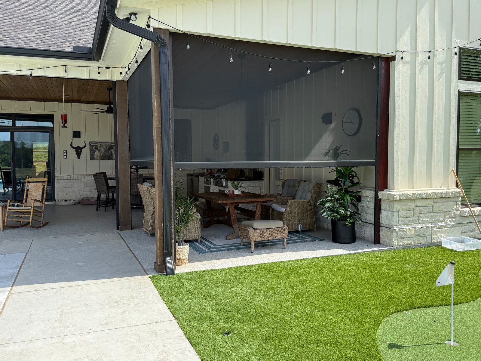 Motorized screens for pergola on a Texas outdoor living area, providing adjustable shade and protection while preserving the open-air view.